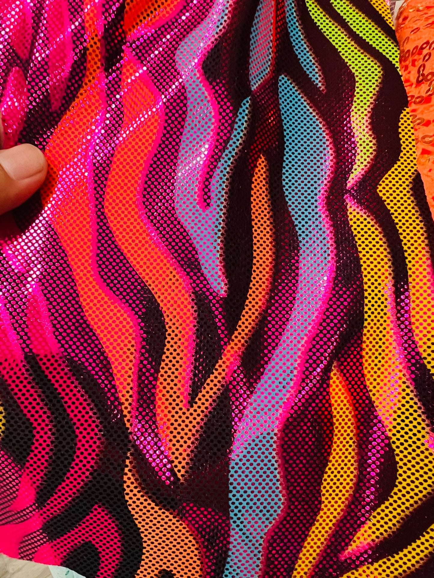 Rainbow zebra design hologram metallic Nylon spandex 4-way stretch 58/60” Sold by the YD. Ships worldwide from Los Angeles California USA