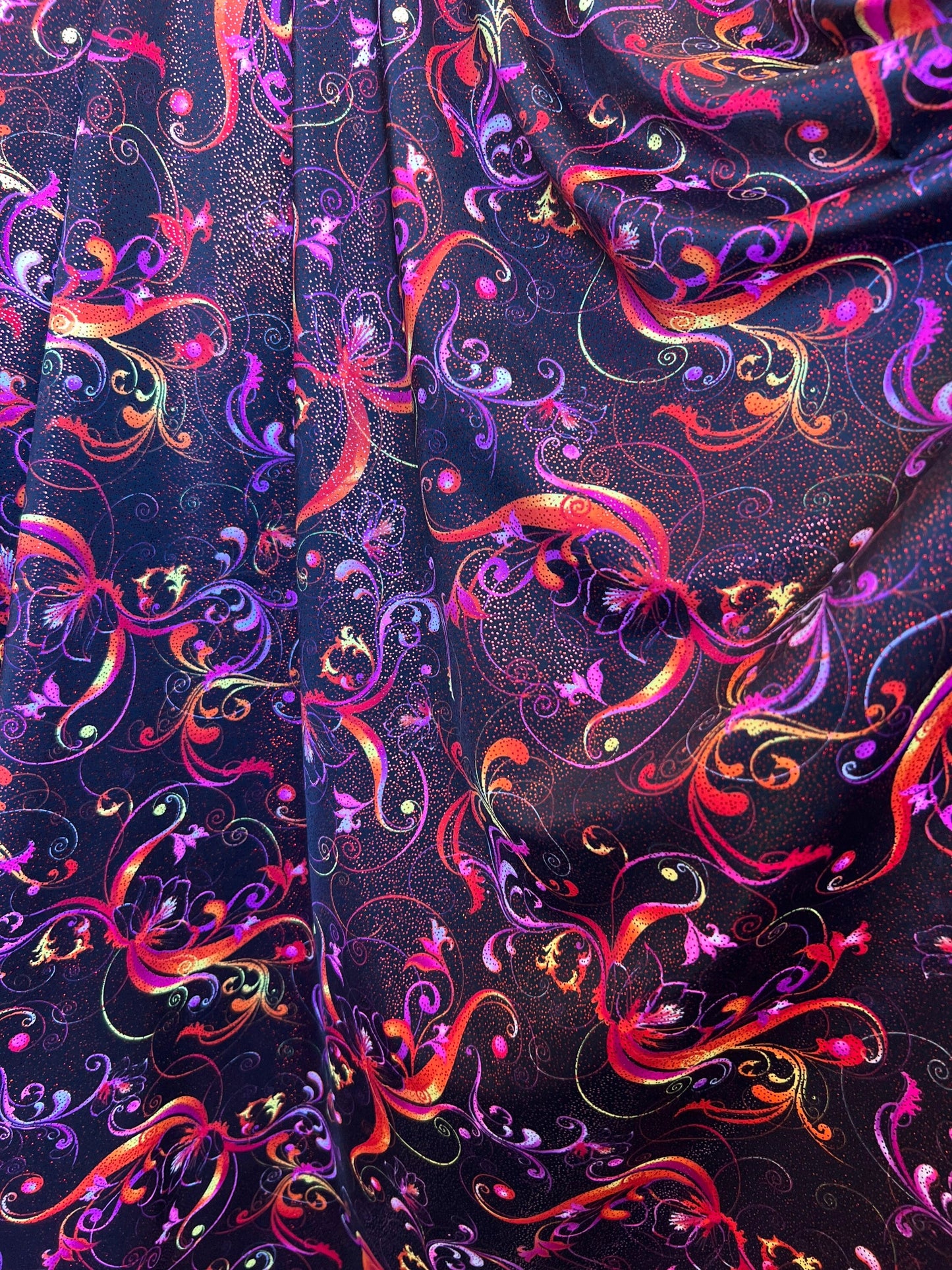 New abstract swirl design black multicolor best quality of nylon spandex with foil 4-way stretch 58/60” Sold bu the YD. Ships worldwide