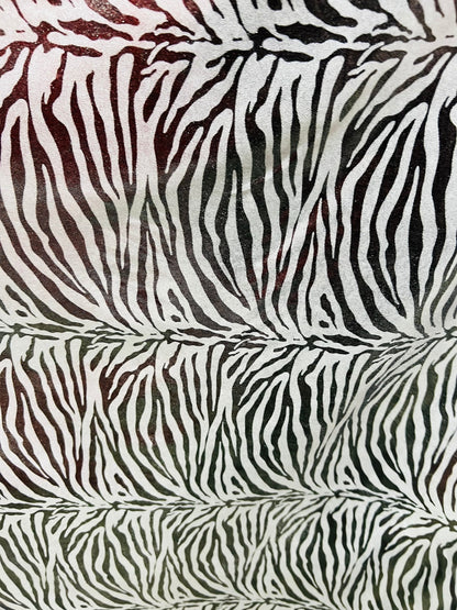 Exotic zebra design metallic nylon spandex with all over foil 4-way stretch 58/60” Sold by the YD. Ships worldwide from Los Angeles