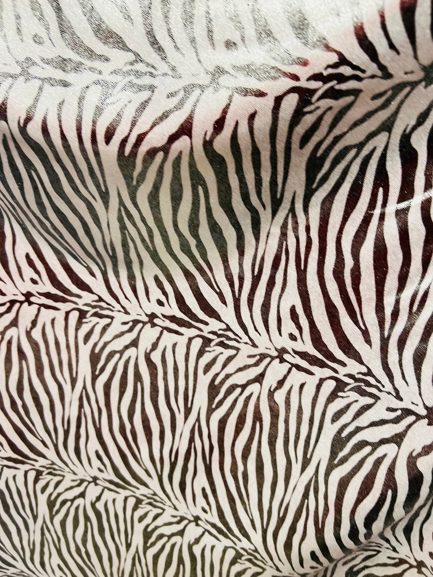 Exotic zebra design metallic nylon spandex with all over foil 4-way stretch 58/60” Sold by the YD. Ships worldwide from Los Angeles