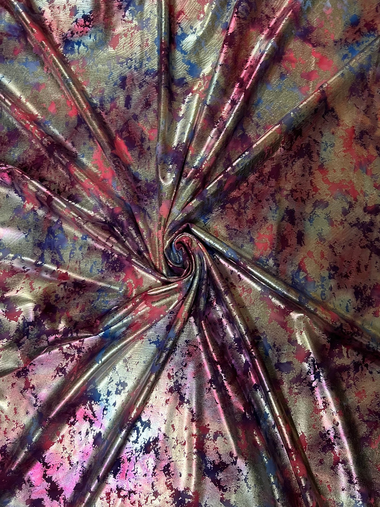 Tie dye splattered design metallic nylon spandex with foil 4-way stretch 58/60” Sold by the YD. Ships worldwide from Los Angeles California