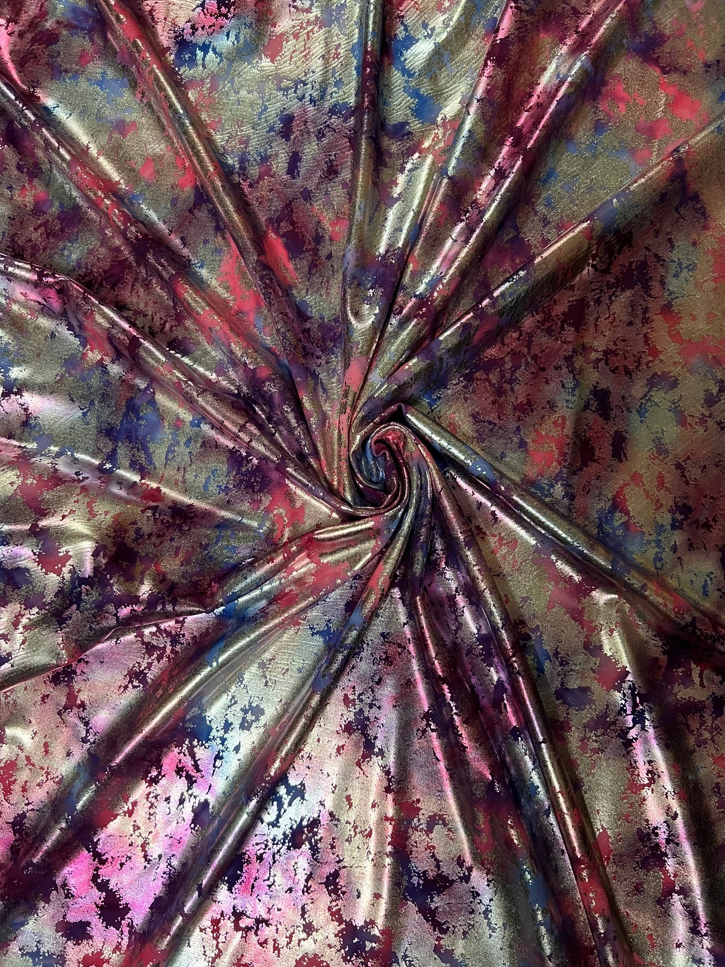 Tie dye splattered design metallic nylon spandex with foil 4-way stretch 58/60” Sold by the YD. Ships worldwide from Los Angeles California