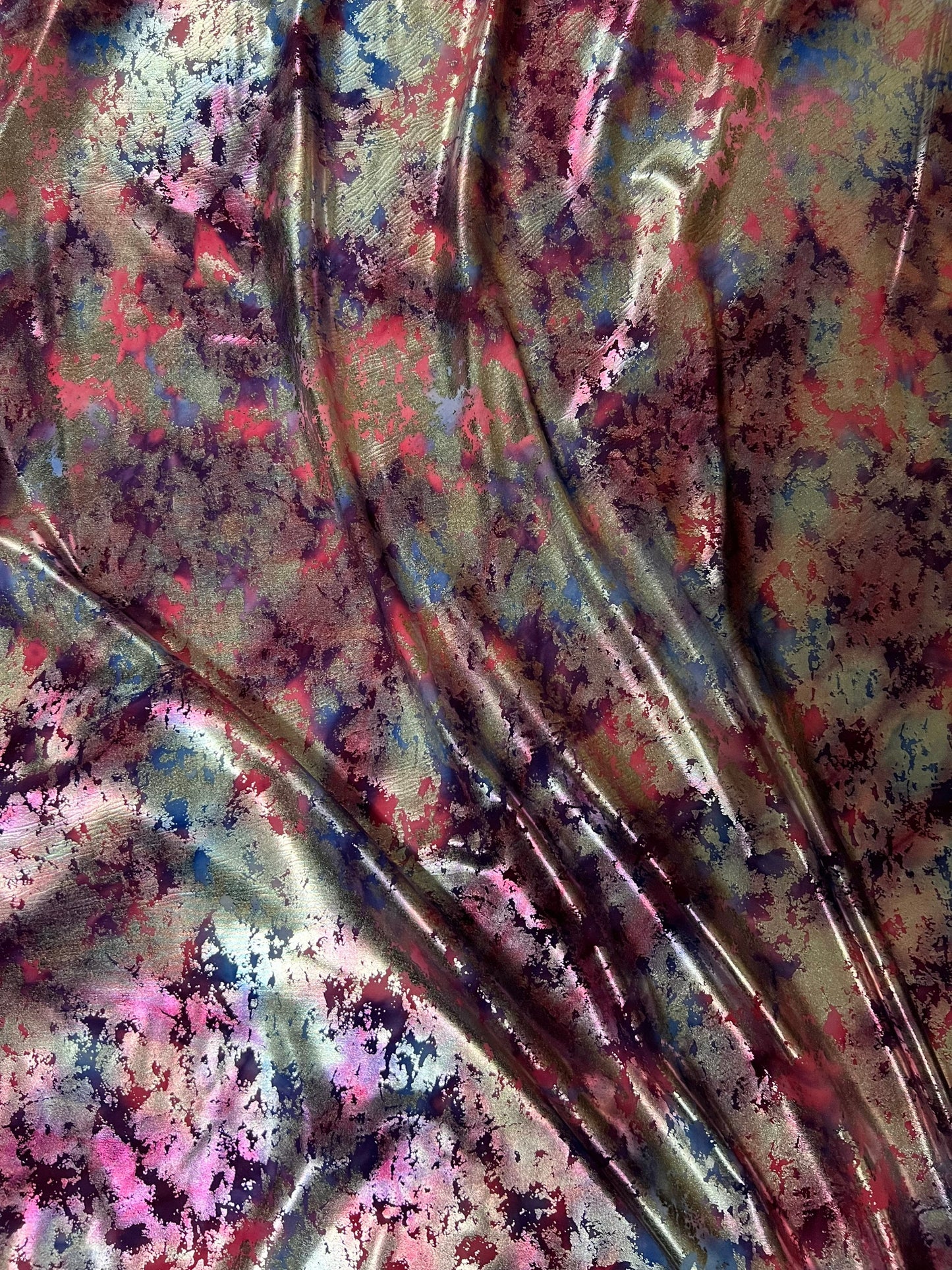 Tie dye splattered design metallic nylon spandex with foil 4-way stretch 58/60” Sold by the YD. Ships worldwide from Los Angeles California