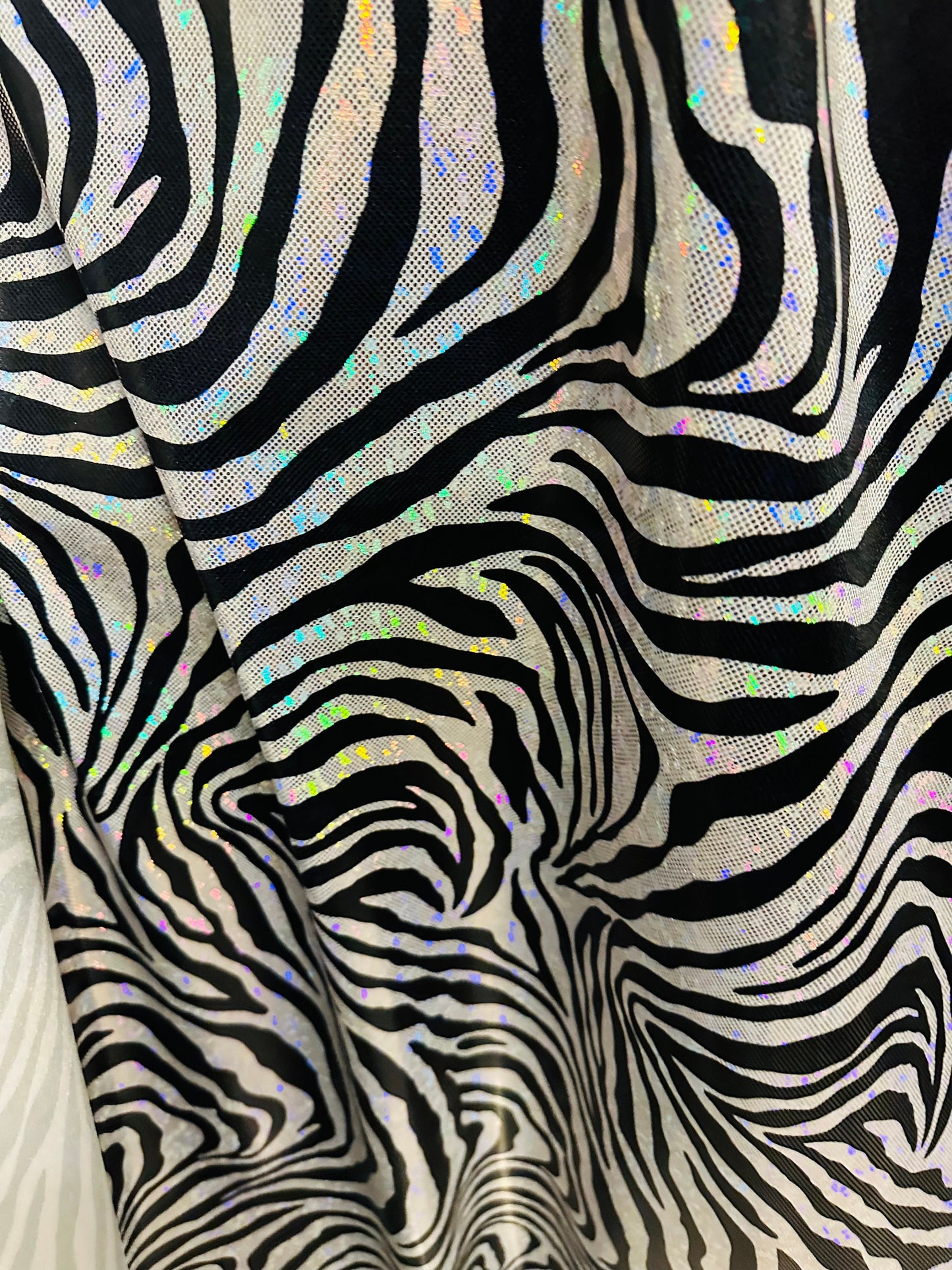 Zebra design exotic animal print on hologram metallic nylon spandex shattered glass 4-way stretch 58/60”