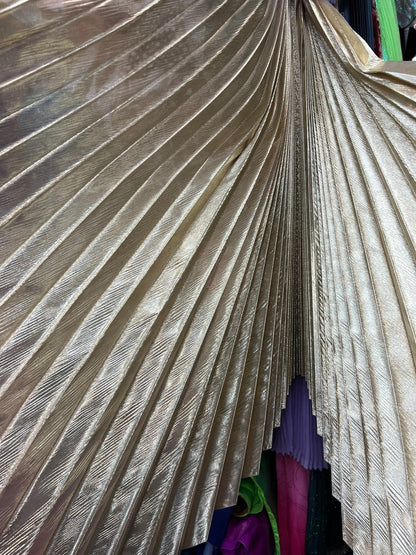 Sunburst pleated metallic lame non stretch 108” length by 45” width Sold by the PC. Ships worldwide from Los Angeles California USA