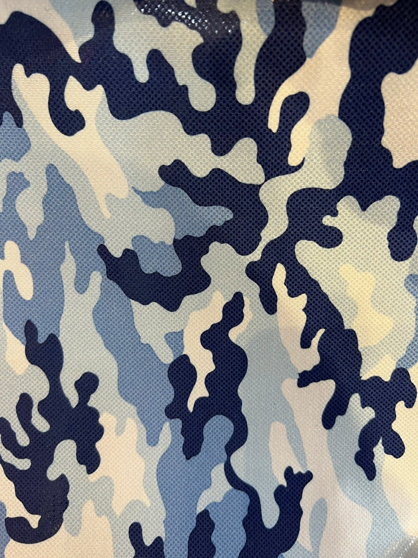Camouflage design metallic Nylon spandex with clear foil dots 4-way stretch 58/60” Sold by the YD. Ships worldwide from Los Angeles CA