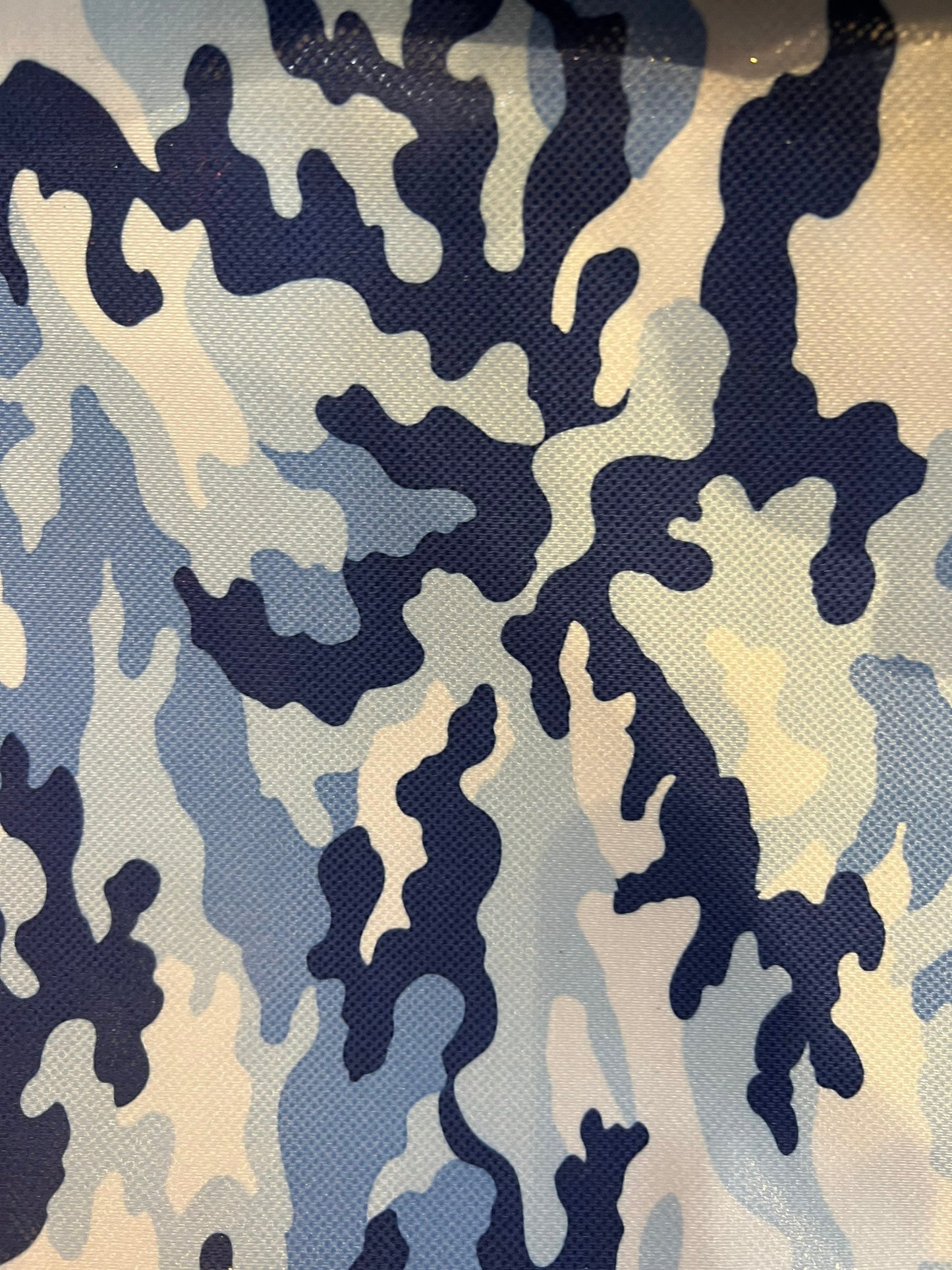 Camouflage design metallic Nylon spandex with clear foil dots 4-way stretch 58/60” Sold by the YD. Ships worldwide from Los Angeles CA