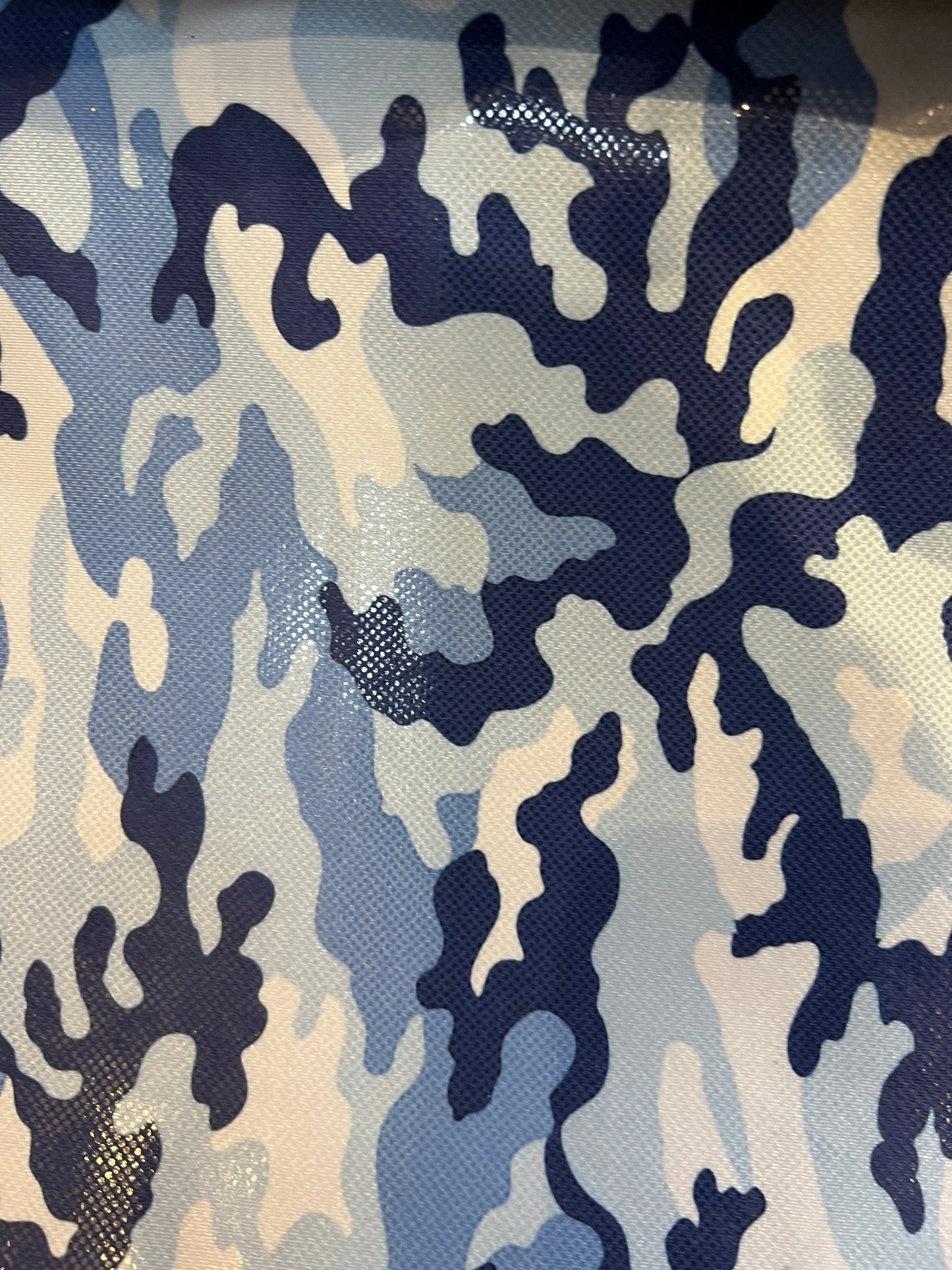 Camouflage design metallic Nylon spandex with clear foil dots 4-way stretch 58/60” Sold by the YD. Ships worldwide from Los Angeles CA