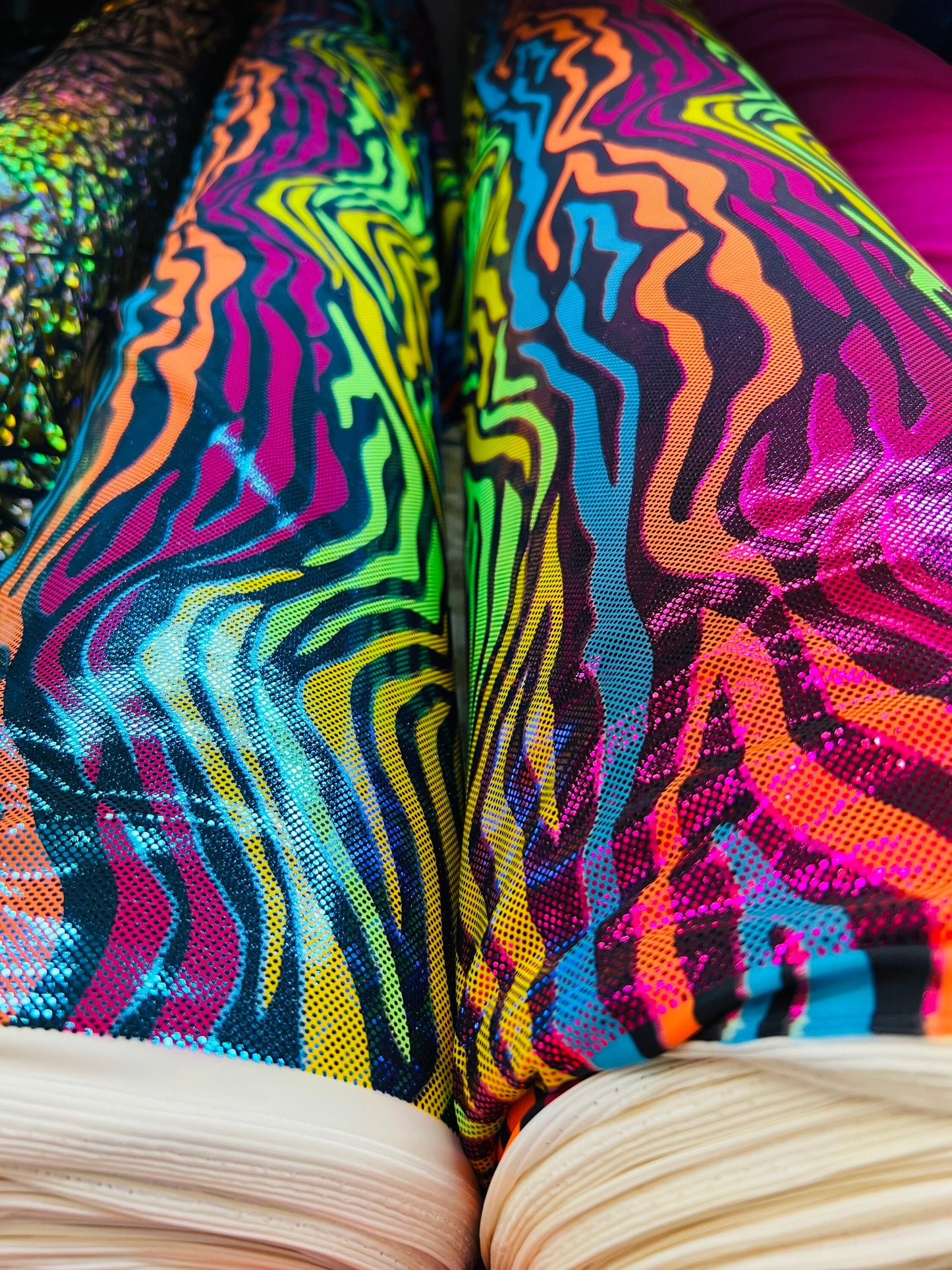 Rainbow zebra design hologram metallic Nylon spandex 4-way stretch 58/60” Sold by the YD. Ships worldwide from Los Angeles California USA