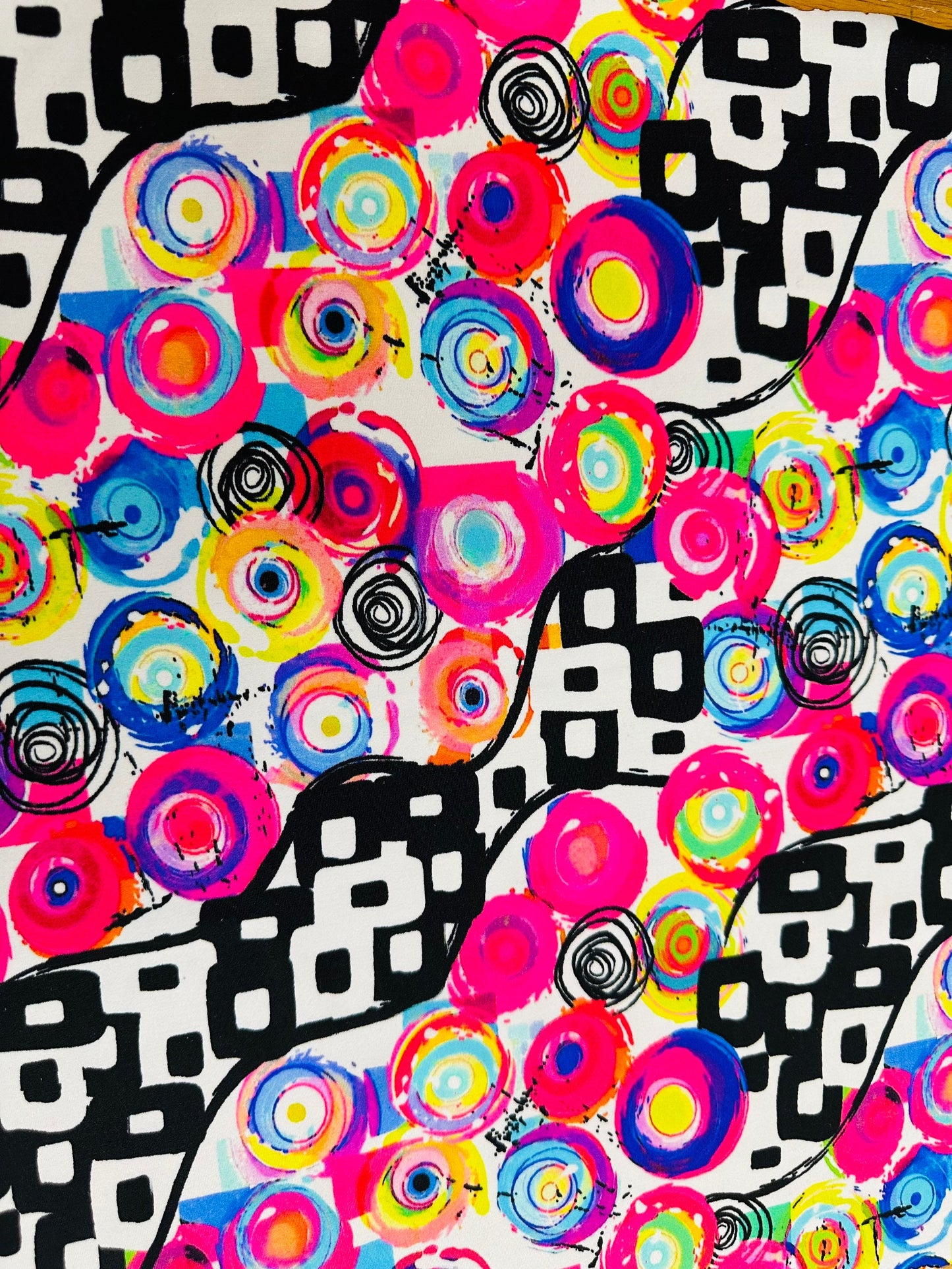 New Geometric abstract design multicolor print on best quality of nylon spandex 4-way stretch 58/60” Sold by the YD.