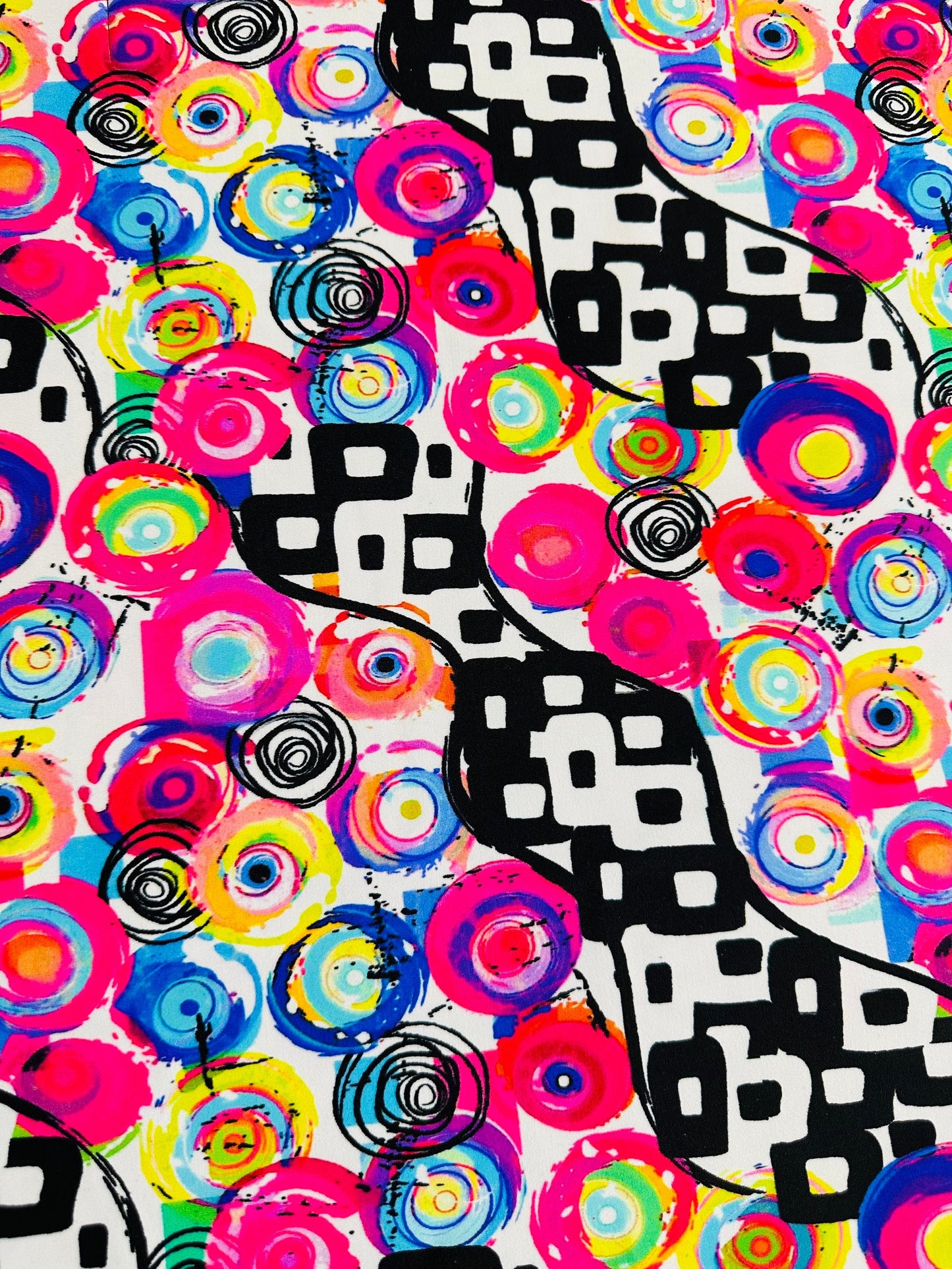 New Geometric abstract design multicolor print on best quality of nylon spandex 4-way stretch 58/60” Sold by the YD.