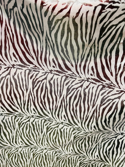 Exotic zebra design metallic nylon spandex with all over foil 4-way stretch 58/60” Sold by the YD. Ships worldwide from Los Angeles