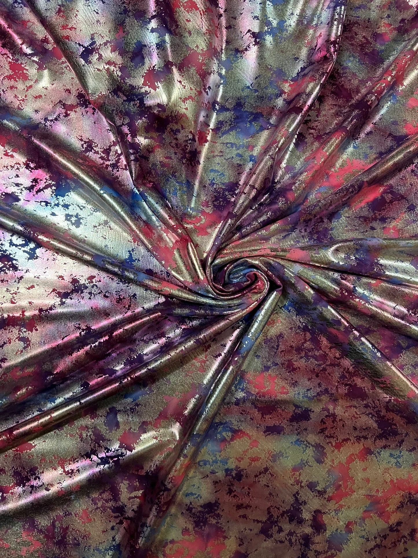 Tie dye splattered design metallic nylon spandex with foil 4-way stretch 58/60” Sold by the YD. Ships worldwide from Los Angeles California