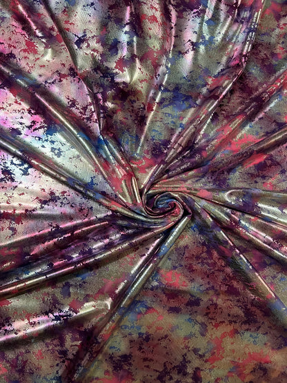 Tie dye splattered design metallic nylon spandex with foil 4-way stretch 58/60” Sold by the YD. Ships worldwide from Los Angeles California