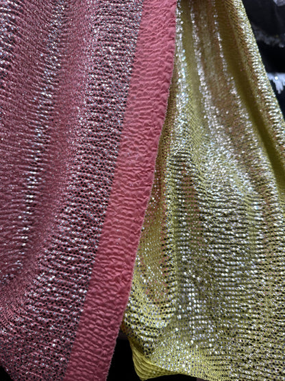 New crinkle metallic poly spandex 2-way stretch 58/60” Sold by the YD. Ships worldwide from Los Angeles California USA