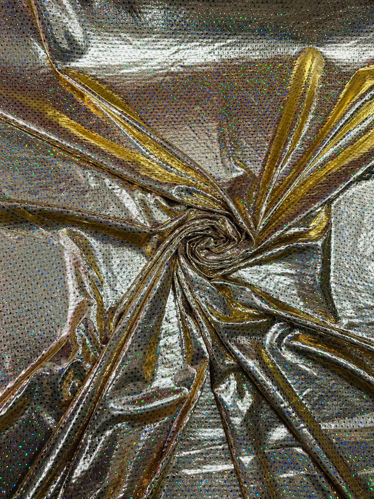 Hologram foggy foil with hologram mini sequins all over super shiny Metallic nylon spandex 4-way stretch 58/60” Sold by the YD.