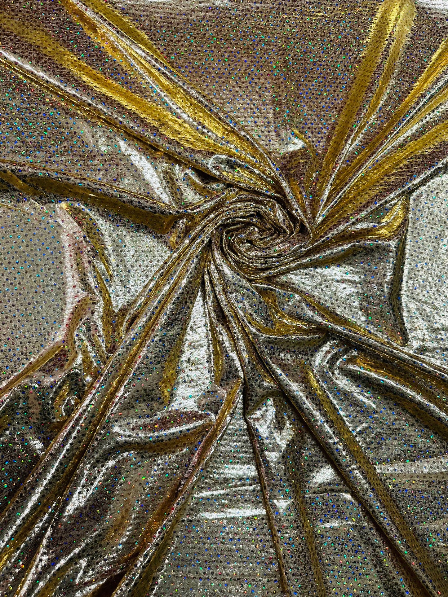 Hologram foggy foil with hologram mini sequins all over super shiny Metallic nylon spandex 4-way stretch 58/60” Sold by the YD.