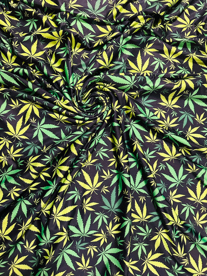 Marijuana leaf design Green/Yellow print on great quality of nylon spandex 4-way stretch 58/60” Sold by the YD. Ships worldwide from L.A