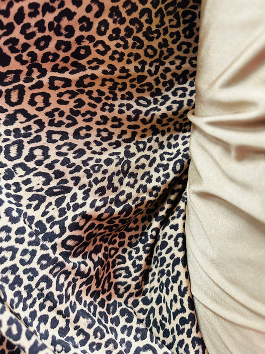 New Exotic Leopard design Nude/Black print nylon spandex 4-way stretch 58/60” Sold by the YD. Ships worldwide from L.A CA