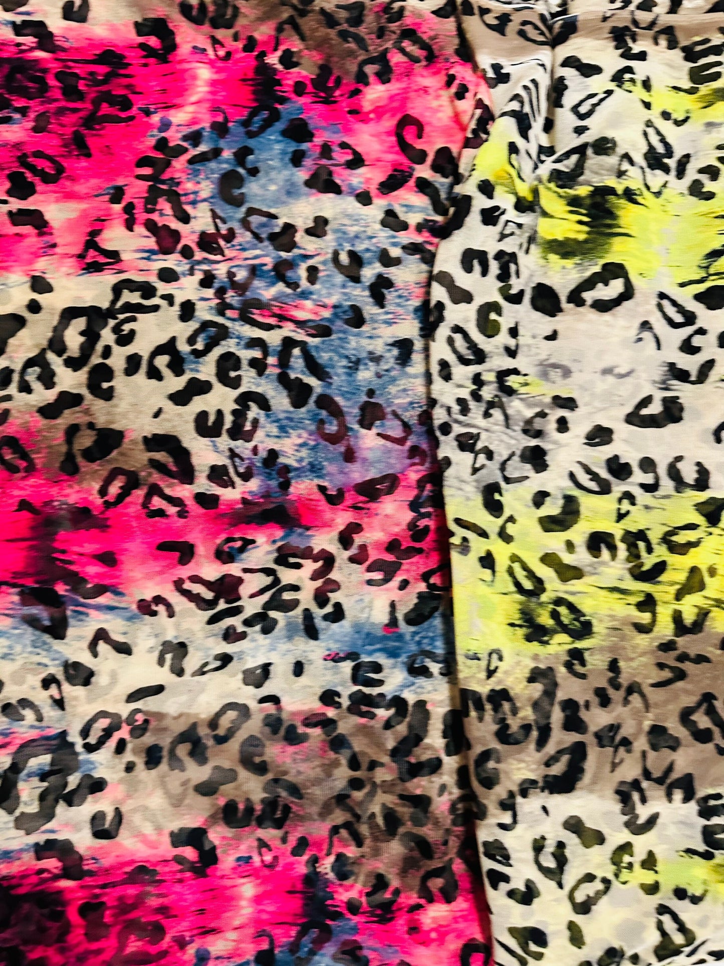 New exotic leopard design it glows in the dark with a black light print on great quality of power mesh spandex 4-way stretch 58/60”