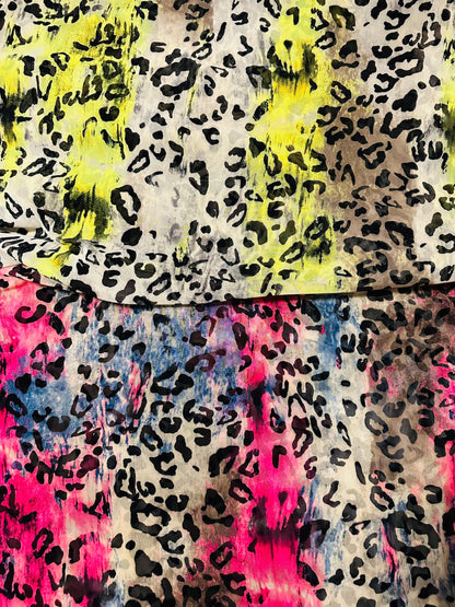 New exotic leopard design it glows in the dark with a black light print on great quality of power mesh spandex 4-way stretch 58/60”