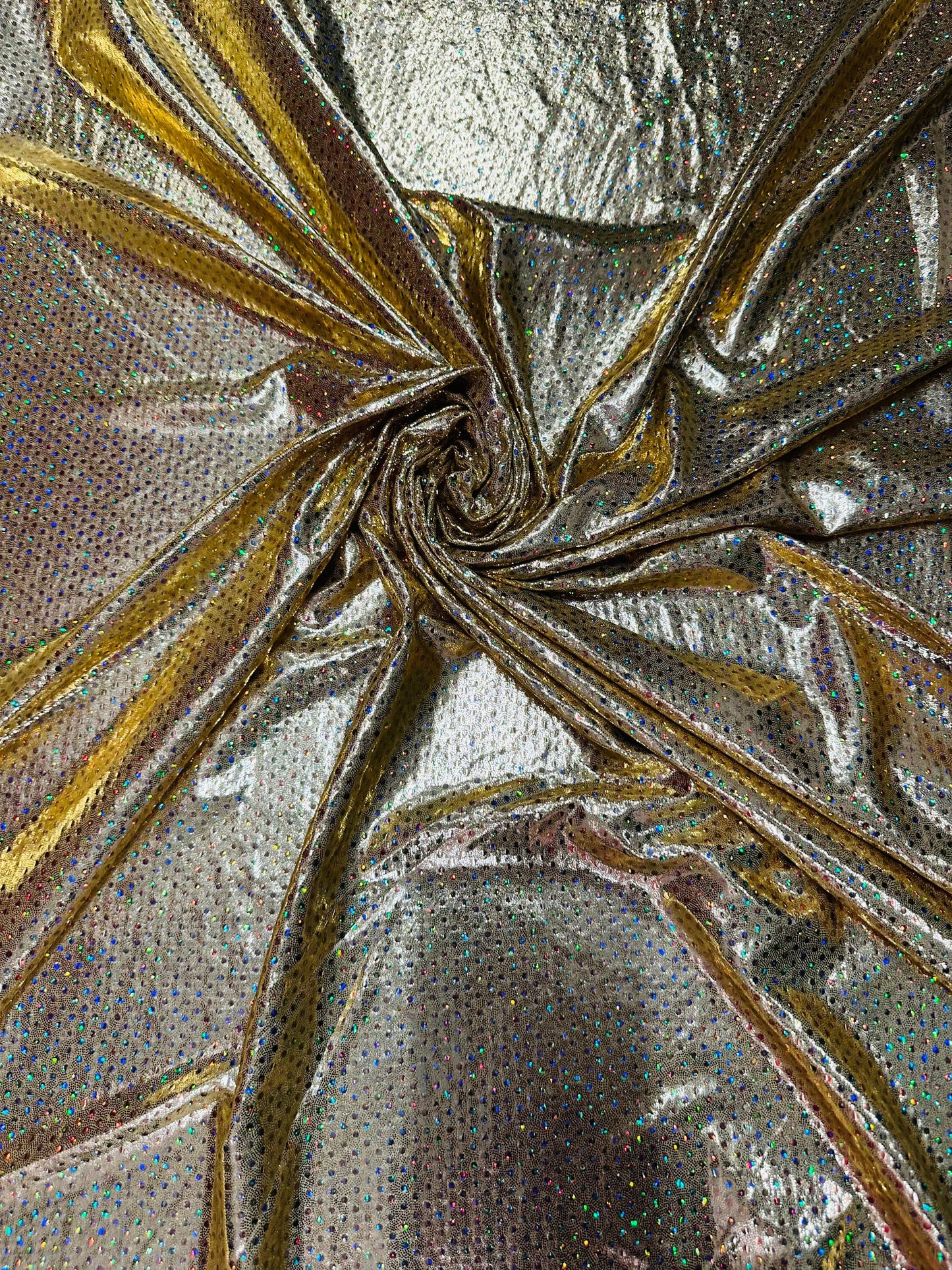 Hologram foggy foil with hologram mini sequins all over super shiny Metallic nylon spandex 4-way stretch 58/60” Sold by the YD.