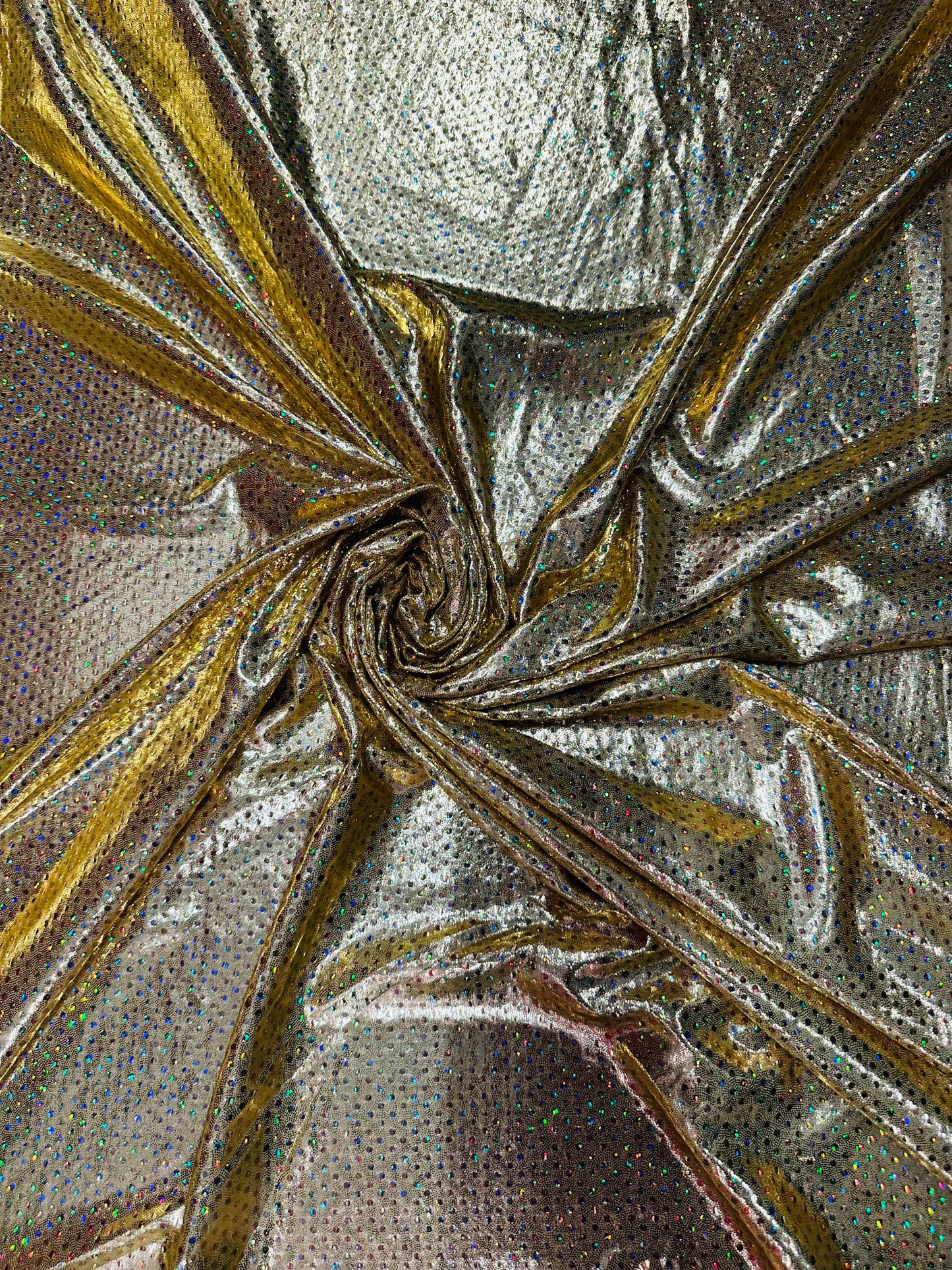 Hologram foggy foil with hologram mini sequins all over super shiny Metallic nylon spandex 4-way stretch 58/60” Sold by the YD.