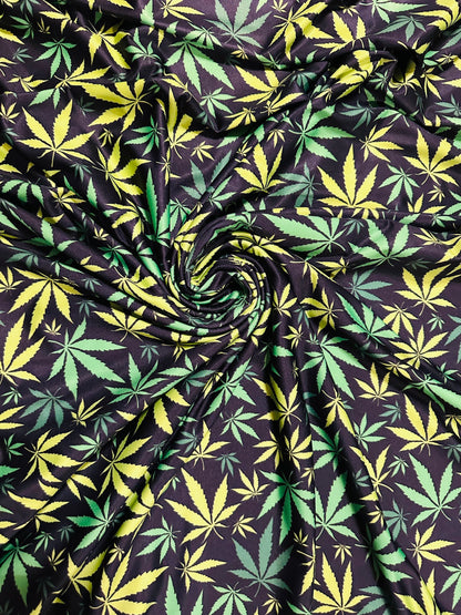 Marijuana leaf design Green/Yellow print on great quality of nylon spandex 4-way stretch 58/60” Sold by the YD. Ships worldwide from L.A