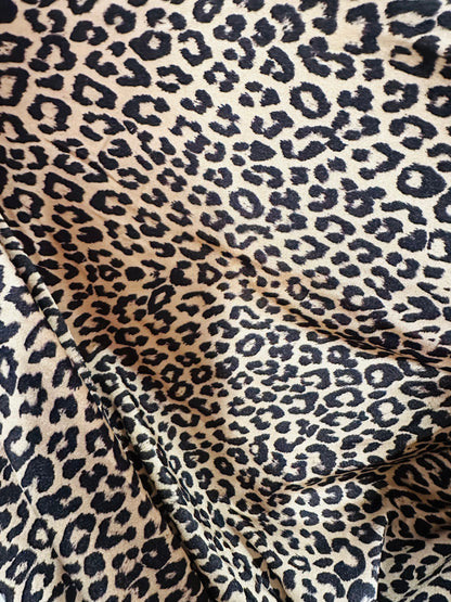 New Exotic Leopard design Nude/Black print nylon spandex 4-way stretch 58/60” Sold by the YD. Ships worldwide from L.A CA