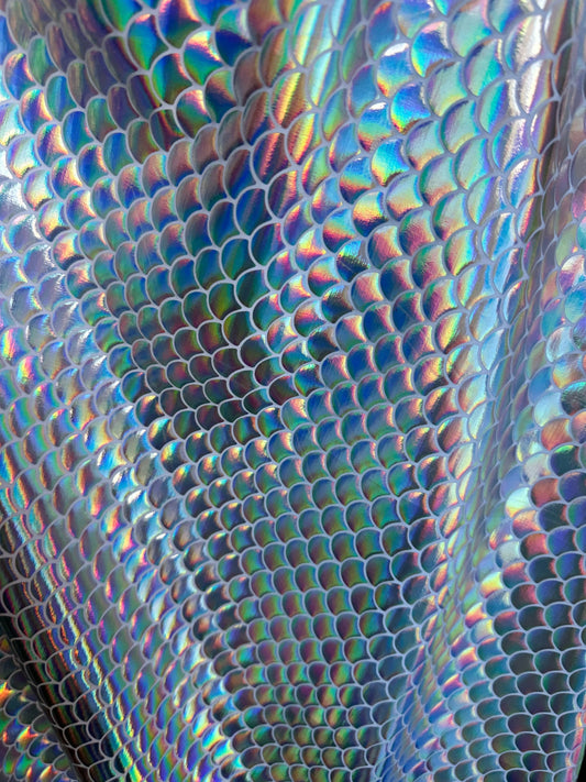 Sirena design iridescent metallic nylon spandex 4-way stretch 58/60” Sold by the YD. Ships worldwide from Los Angeles California USA