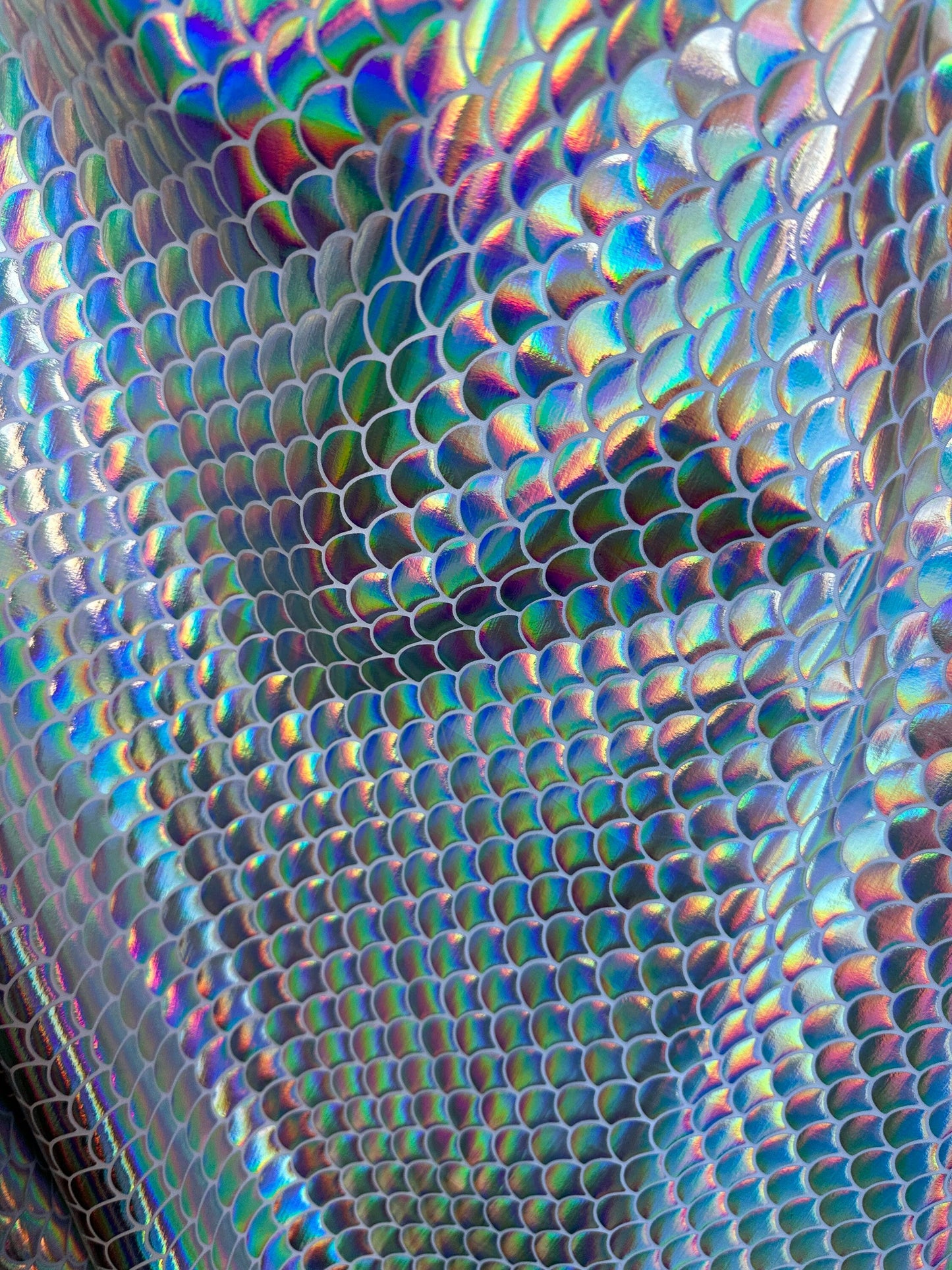 Sirena design iridescent metallic nylon spandex 4-way stretch 58/60” Sold by the YD. Ships worldwide from Los Angeles California USA