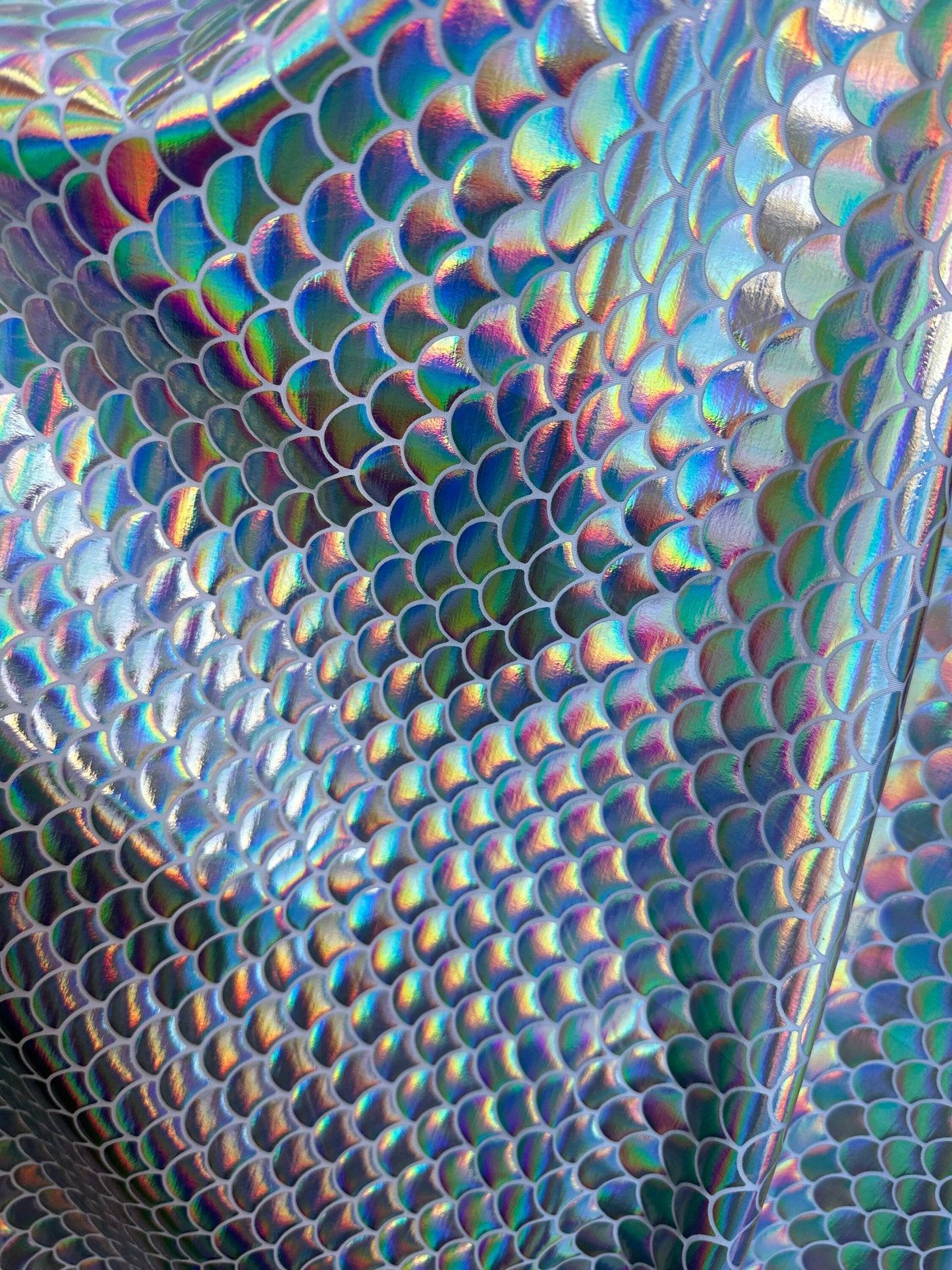 Sirena design iridescent metallic nylon spandex 4-way stretch 58/60” Sold by the YD. Ships worldwide from Los Angeles California USA