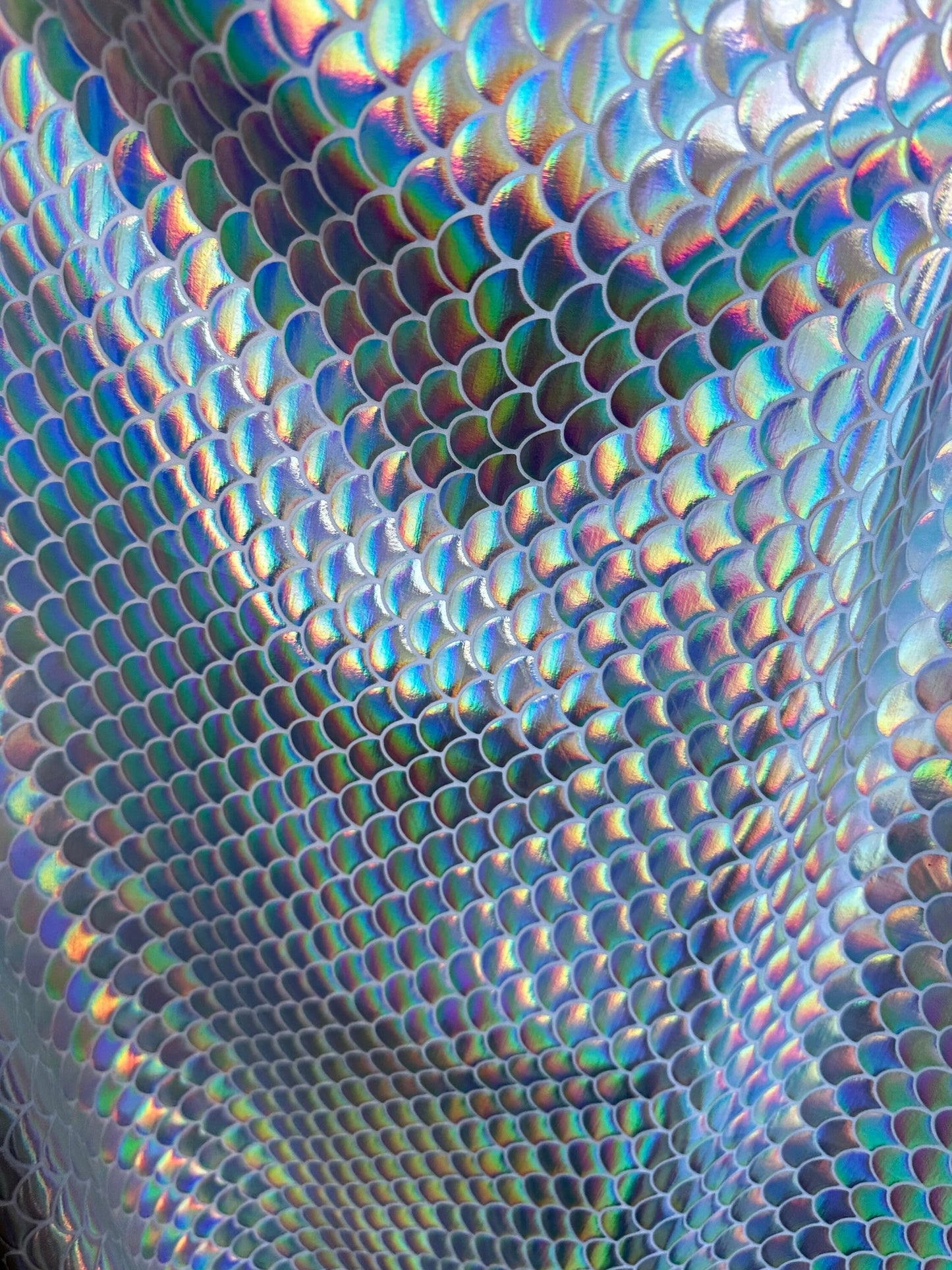 Sirena design iridescent metallic nylon spandex 4-way stretch 58/60” Sold by the YD. Ships worldwide from Los Angeles California USA