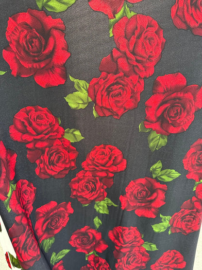 New Liverpool poly spandex red roses design 2-way stretch 58/60” Sold by the Yd. Ships worldwide from Los Ángeles California USA.
