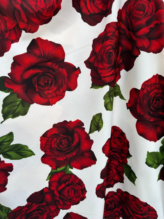 New Liverpool poly spandex red roses design 2-way stretch 58/60” Sold by the Yd. Ships worldwide from Los Ángeles California USA.
