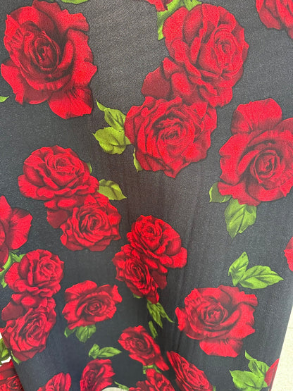 New Liverpool poly spandex red roses design 2-way stretch 58/60” Sold by the Yd. Ships worldwide from Los Ángeles California USA.
