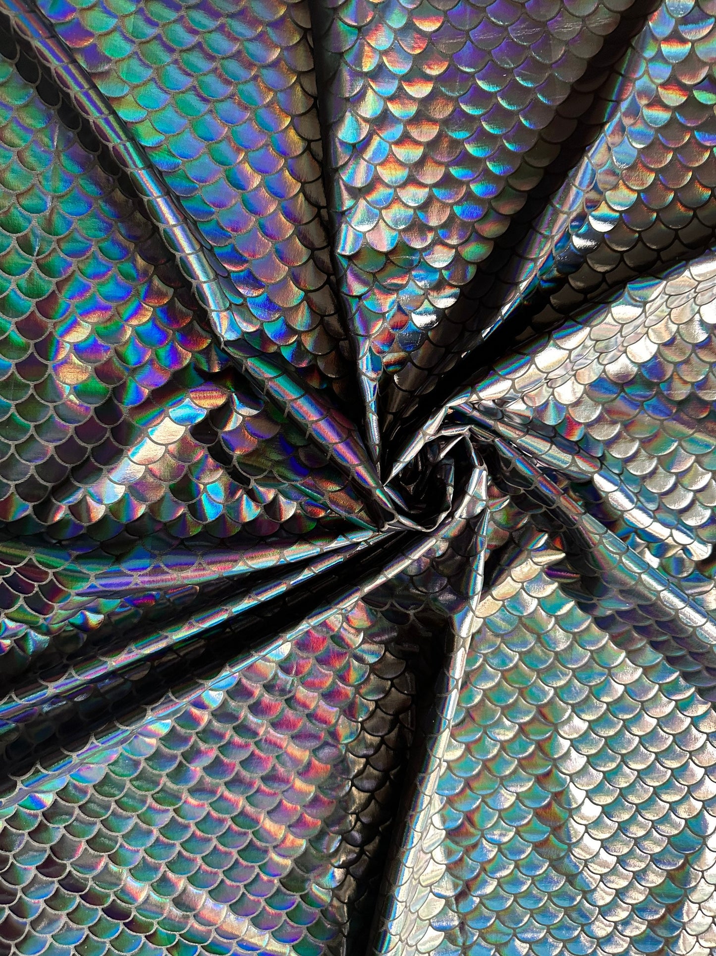 Mermaid Fish scale design Iridescent black metallic nylon spandex 4-way stretch 58/60” Sold by the YD. Ships worldwide from L.A