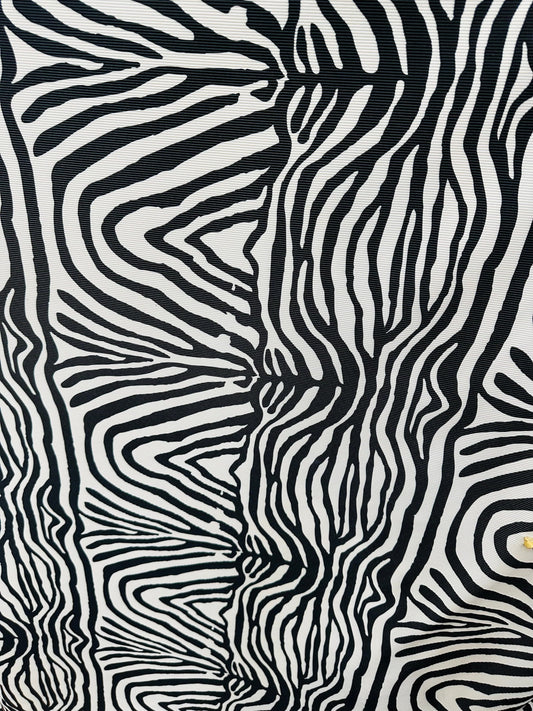 New Exotic zebra design print on great quality of ribbed nylon spandex 4-way stretch 58/60” Sold by the YD. Ships worldwide from L.A CA