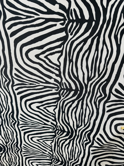 New Exotic zebra design print on great quality of ribbed nylon spandex 4-way stretch 58/60” Sold by the YD. Ships worldwide from L.A CA