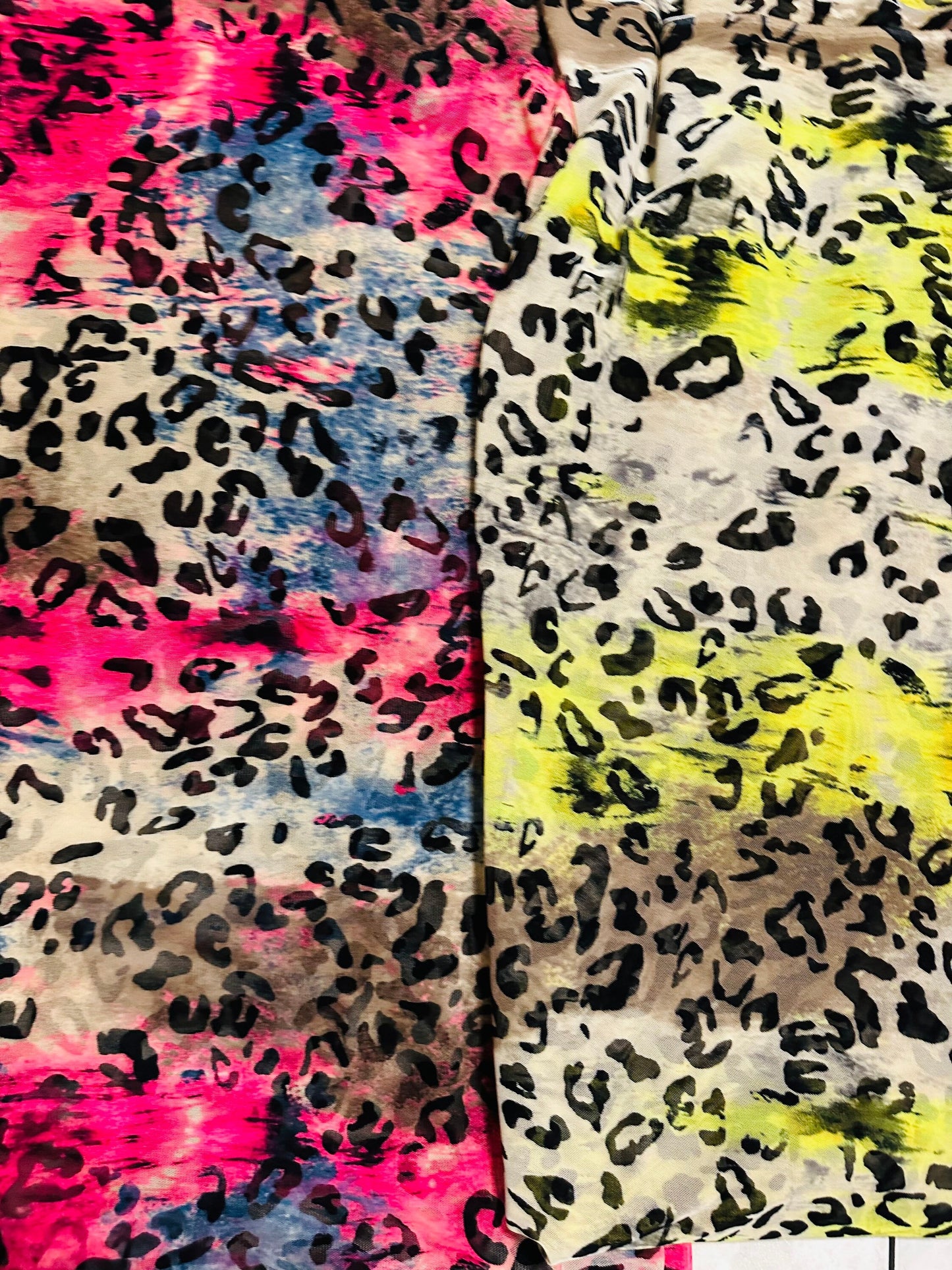 New exotic leopard design it glows in the dark with a black light print on great quality of power mesh spandex 4-way stretch 58/60”