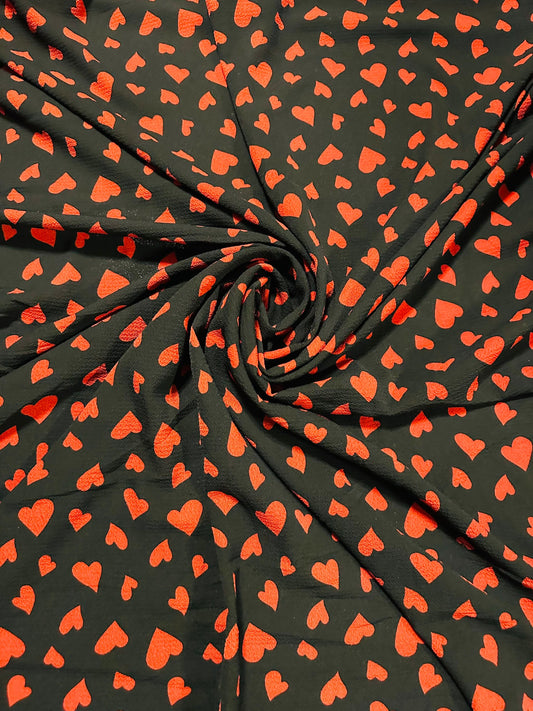 New Romantic Heart design Black/Red print on Polyester crepe spandex one way stretch light fabric 58/60” Sold by the YD.