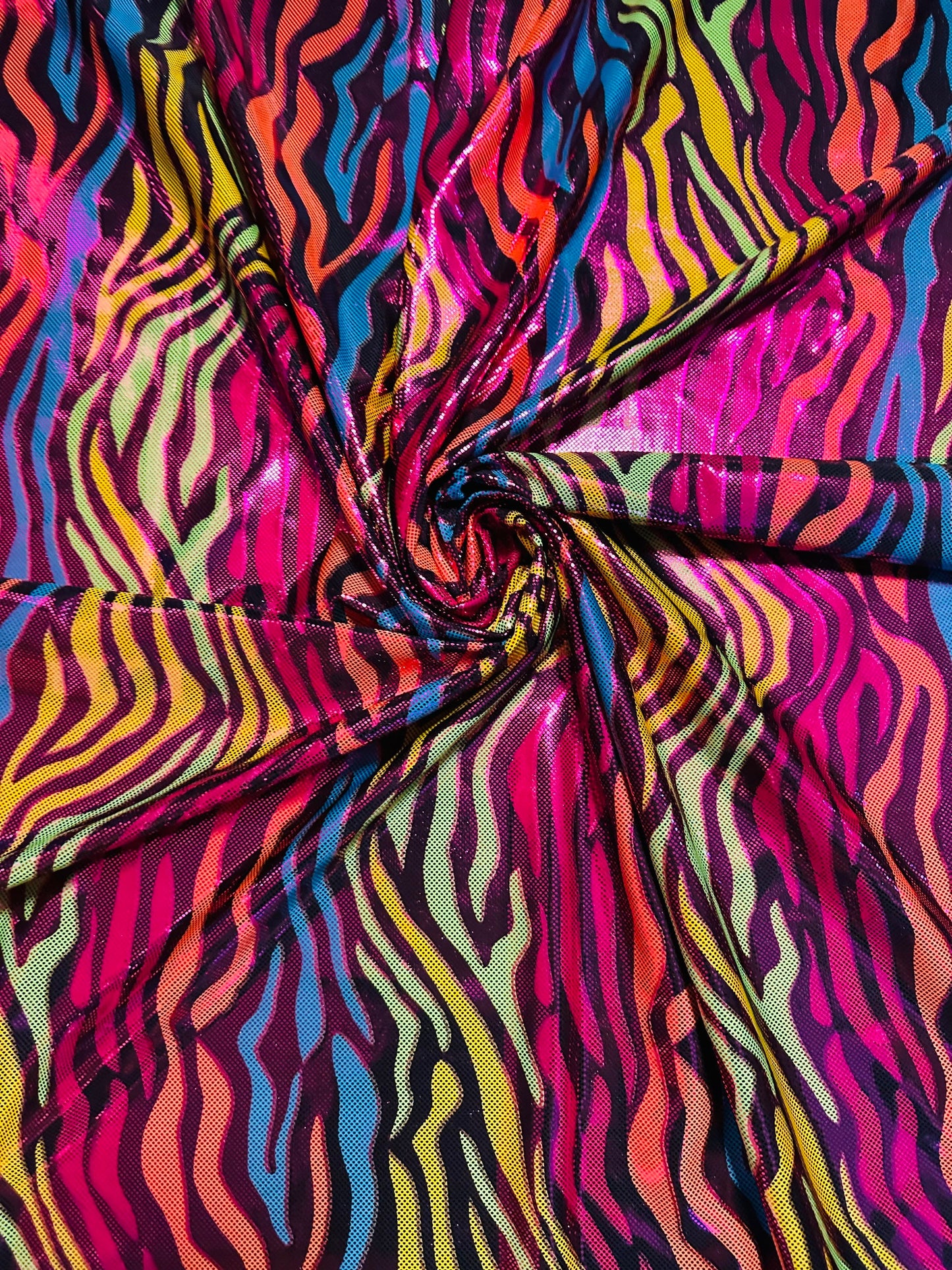 Exotic zebra design hologram metallic nylon spandex 4-way stretch 58/60” Sold by the YD. Ships worldwide from Los Angeles California USA