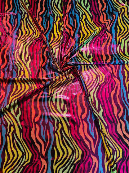 Exotic zebra design hologram metallic nylon spandex 4-way stretch 58/60” Sold by the YD. Ships worldwide from Los Angeles California USA