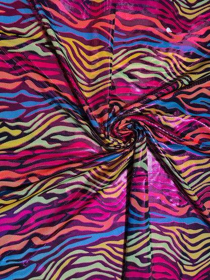 Exotic zebra design hologram metallic nylon spandex 4-way stretch 58/60” Sold by the YD. Ships worldwide from Los Angeles California USA