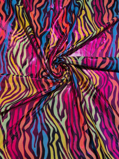 Exotic zebra design hologram metallic nylon spandex 4-way stretch 58/60” Sold by the YD. Ships worldwide from Los Angeles California USA