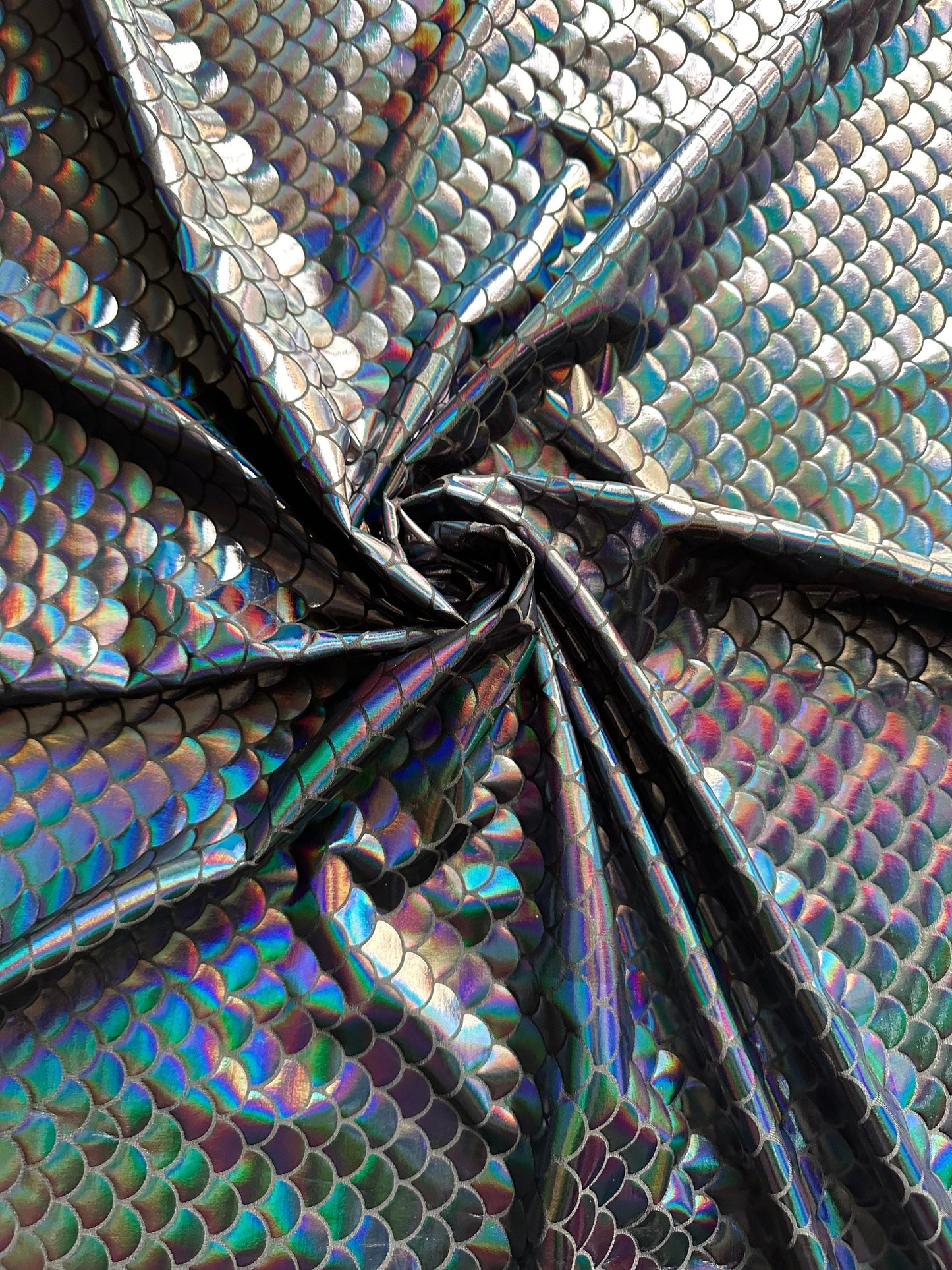 Mermaid Fish scale design Iridescent black metallic nylon spandex 4-way stretch 58/60” Sold by the YD. Ships worldwide from L.A