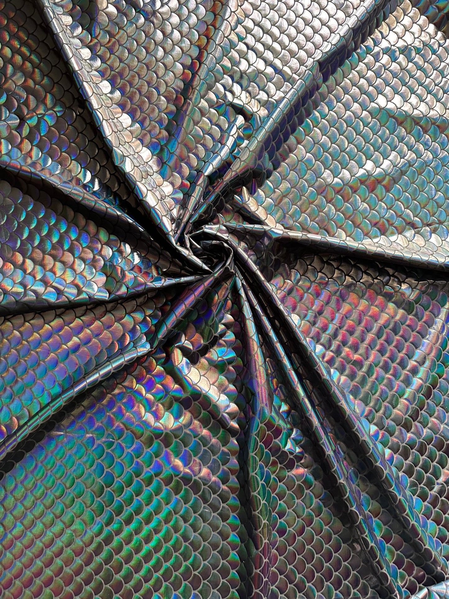 Mermaid Fish scale design Iridescent black metallic nylon spandex 4-way stretch 58/60” Sold by the YD. Ships worldwide from L.A