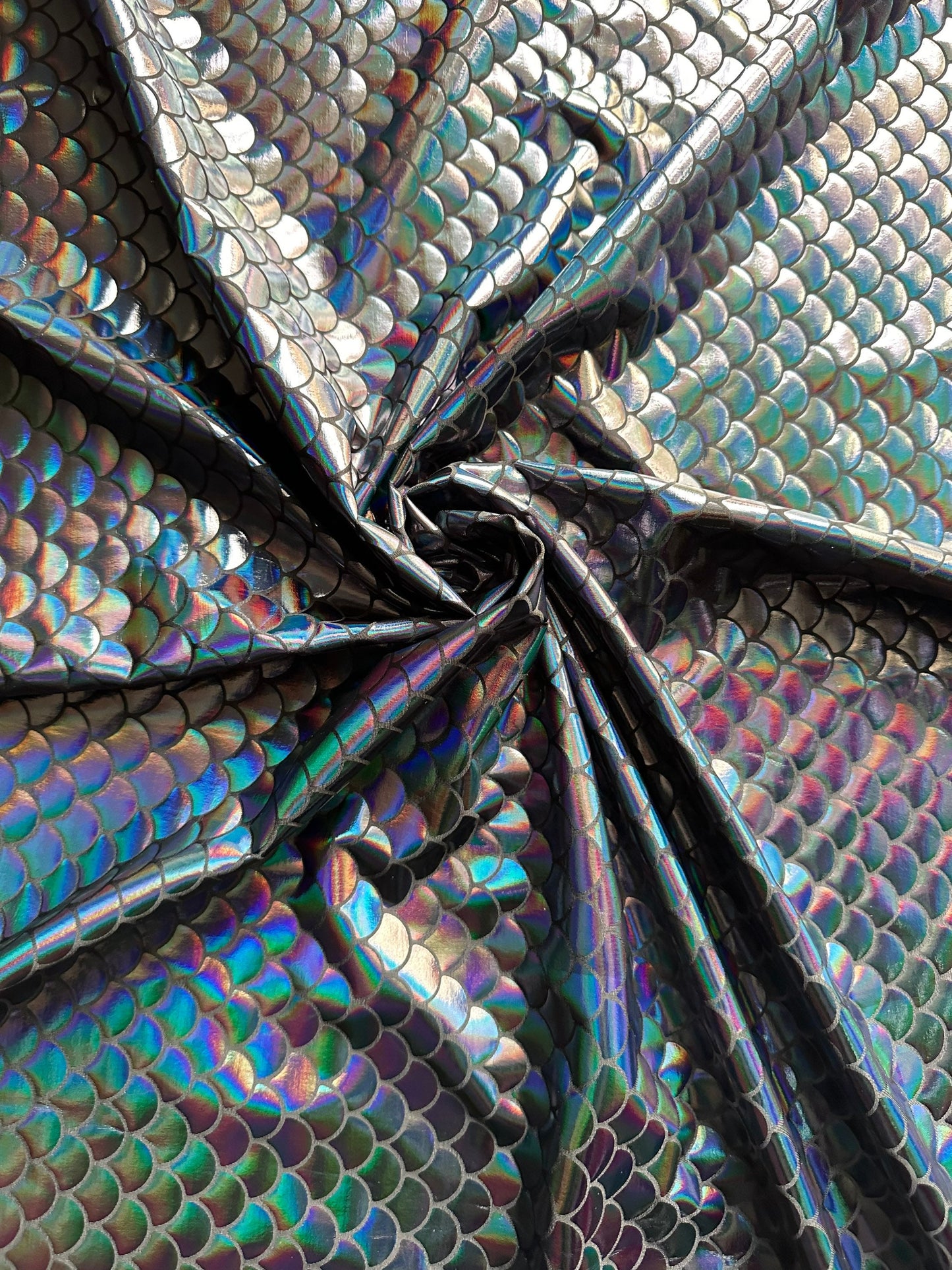 Mermaid Fish scale design Iridescent black metallic nylon spandex 4-way stretch 58/60” Sold by the YD. Ships worldwide from L.A