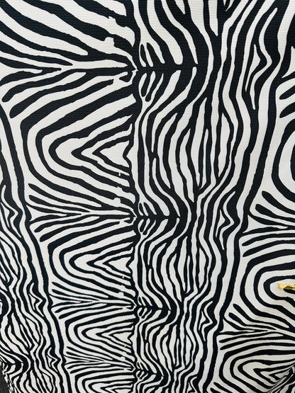 New Exotic zebra design print on great quality of ribbed nylon spandex 4-way stretch 58/60” Sold by the YD. Ships worldwide from L.A CA