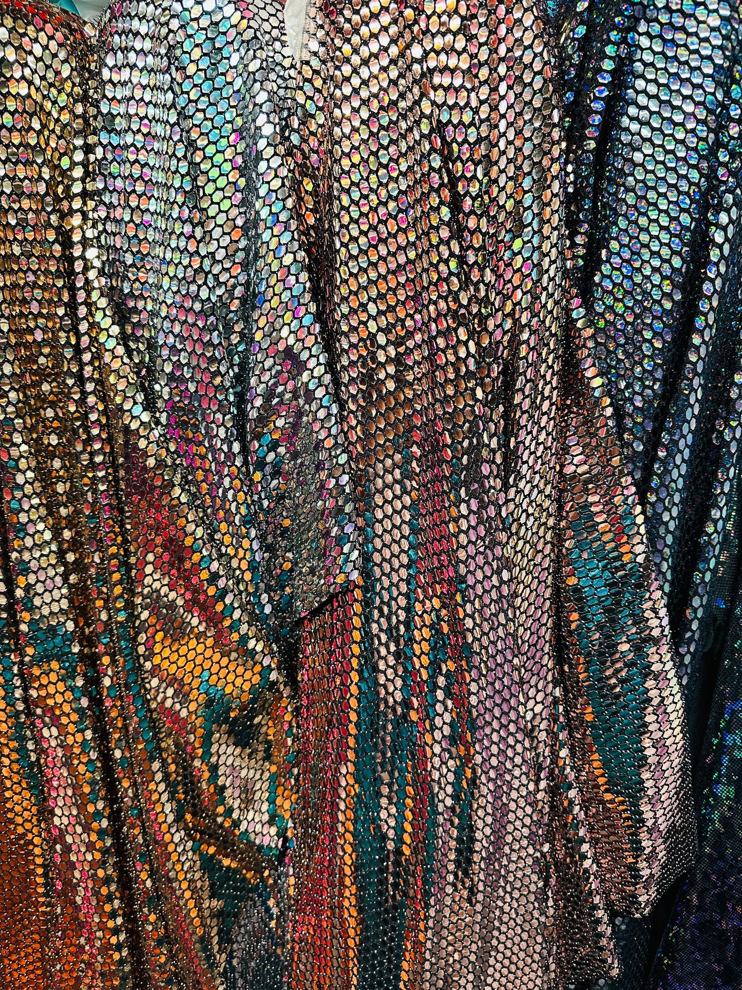 Honeycomb geometric design metallic spandex with shiny sequins 2-way stretch 58/60” Sold by the YD. Ships worldwide from L.A